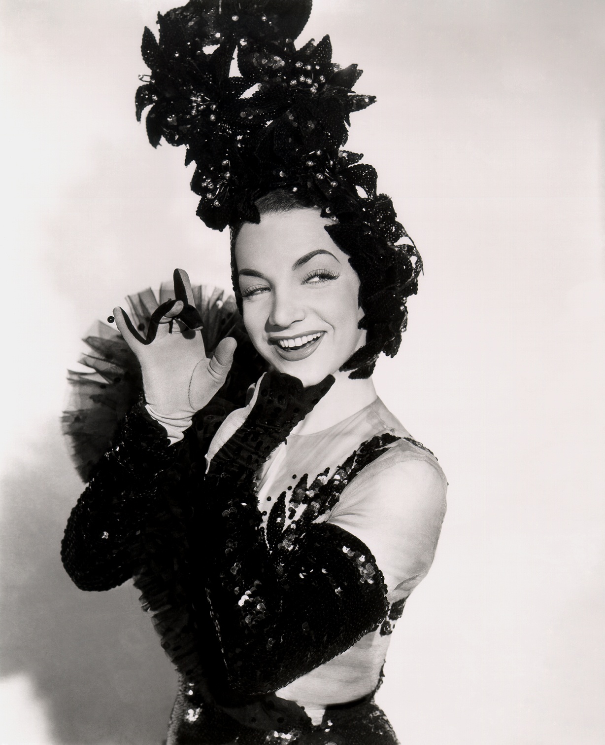 Imagem de referência de Carmen Miranda, descrito nos dados abertos como cantora luso-brasileira (1909–1955)