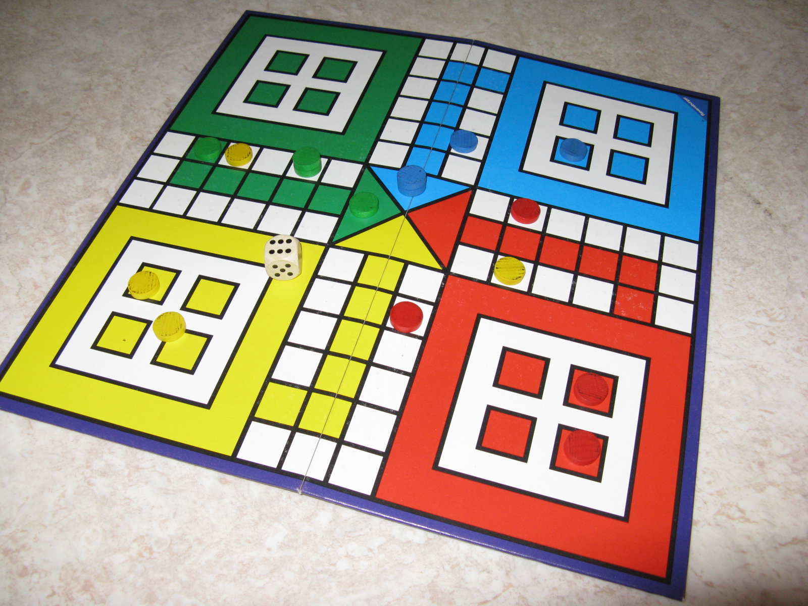 Imagem de referência de Ludo, descrito nos dados abertos como jogo de tabuleiro