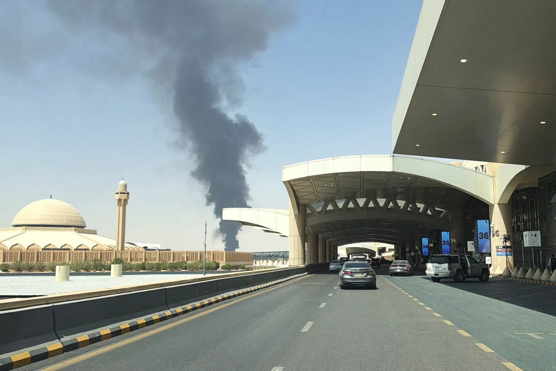 Smoke rising from a fuel storage depot near King Khalid International Airport in Riyadh on Sept 19.