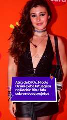 Atriz de D.P.A., Nicole Orsini exibe tatuagem no Rock in Rio e fala sobre novos projetos