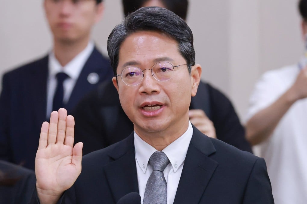 Kim Seung-won takes an oath at the start of his parliamentary confirmation hearing at the National Assembly in Seoul on Tuesday. Photo: Yonhap / EPA