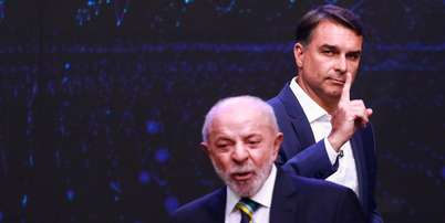 Fl&aacute;vio Bolsonaro (PL) e Lula (PT) durante debate realizado pela Band Foto: ALOISIO MAURICIO/FOTOARENA/ESTAD&Atilde;O CONTE&Uacute;DO / Estad&atilde;o